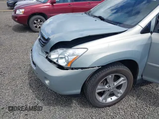 2006 Lexus RX 400h z VIN JTJHW31U860010706, wystawiony jako IAAI lot #42286504 z przebiegiem 220 671 mil mil oraz . Historia ofert i sprzedaży dostępna na DreamBid. Obrazek 16.