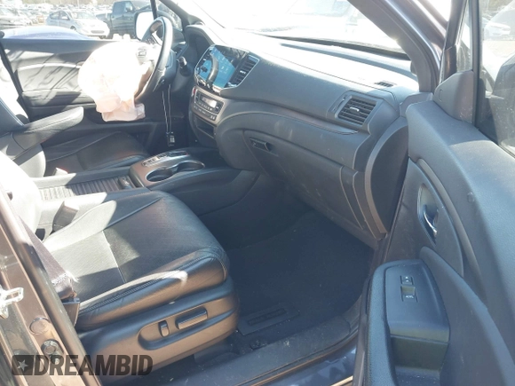 2019 Honda Passport EX-L with VIN 5FNYF7H54KB000467, listed as a IAAI auction lot 41342341 with 172,811 mi miles and . Bid and sale history available at carsss.com. Image 5.