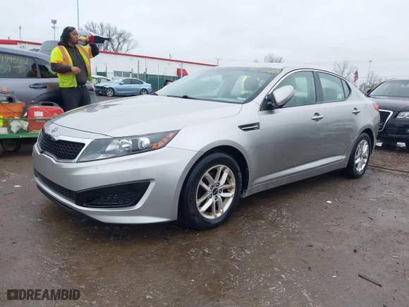 2011 Kia Optima LX with VIN KNAGM4A76B5146718, listed as a IAAI auction lot 42006225 with 213,939 mi miles. Bid and sale history available at carsss.com. Image 18.