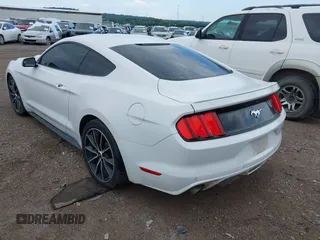 2015 Ford Mustang EcoBoost with VIN 1FA6P8TH6F5311018, listed as a IAAI auction lot 42649308 with 105,527 mi miles and . Bid and sale history available at DreamBid. Image 3.