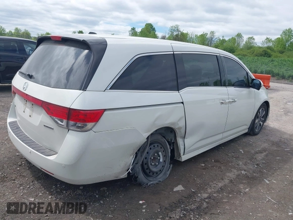 2015 Honda Odyssey Touring Elite с VIN 5FNRL5H91FB012330, выставлен на аукционе IAAI как лот 42307107 с пробегом 152 087 миль миль и . История ставок и продаж доступна на DreamBid. Изображение 4.