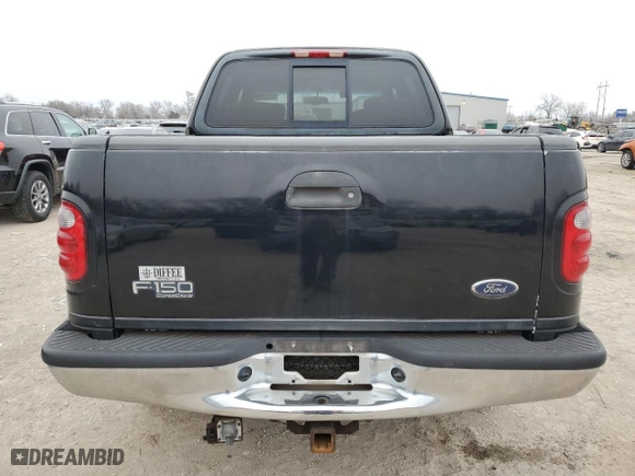 2001 Ford F-150 SuperCrew XLT with VIN 1FTRW08L41KC43045, listed as a Copart auction lot 43634255 with 191,262 mi miles and Salvage Title. Bid and sale history available at carsss.com. Image 6.
