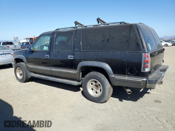 1999 Chevrolet Suburban with VIN 1GNGK26R5XJ513945, listed as a Copart auction lot 73673314 with 198,656 mi miles and Clean Title. Bid and sale history available at carsss.com. Image 2.