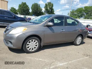 2012 Nissan Versa SV with VIN 3N1CN7AP7CL930619, listed as a Copart auction lot 63657855 with 106,911 mi miles and Salvage title. Bid and sale history available at DreamBid. Image 1.