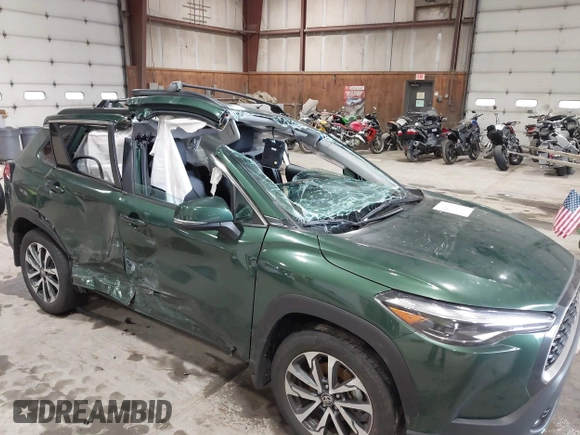2022 Toyota Corolla Cross XLE with VIN 7MUDAABG9NV043308, listed as a IAAI auction lot 42467615 with 45,502 mi miles and . Bid and sale history available at DreamBid. Image 6.