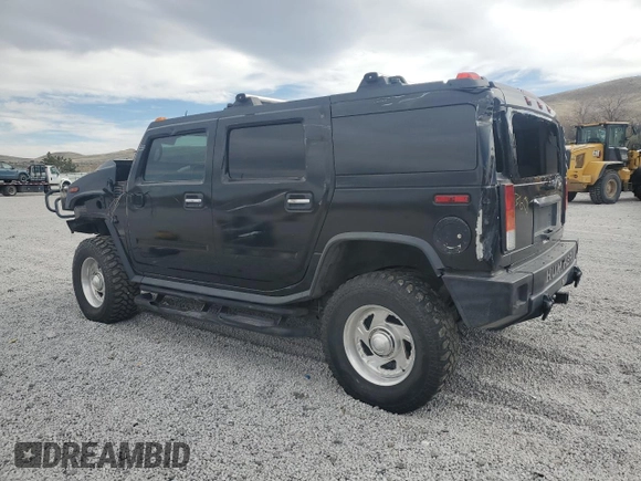 2004 Hummer H2 z VIN 5GRGN23U74H100175, wystawiony jako Copart lot #52642125 z przebiegiem 112 305 mil mil oraz Szkoda całkowita • Salvage title. Historia ofert i sprzedaży dostępna na DreamBid. Obrazek 2.