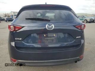 2018 Mazda CX-5 Grand Touring with VIN JM3KFADM7J0380568, listed as a Copart auction lot 48749015 with 53,401 mi miles and Salvage Title. Bid and sale history available at carsss.com. Image 6.