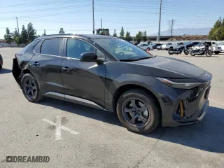 2023 Toyota bZ4X XLE with VIN JTMAAAAA9PA021173, listed as a Copart auction lot 73781034 with 51,882 mi miles and Salvage Title. Bid and sale history available at carsss.com. Image 4.