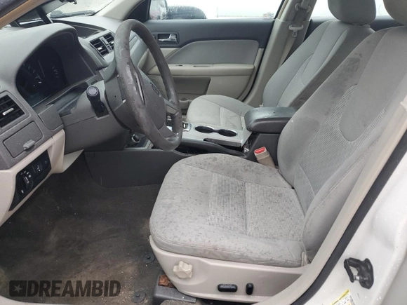 2012 Ford Fusion SE z VIN 3FAHP0HA4CR185059, wystawiony jako Copart lot #56875985 z przebiegiem 173 644 mil mil oraz Nie do naprawy. Historia ofert i sprzedaży dostępna na DreamBid. Obrazek 7.