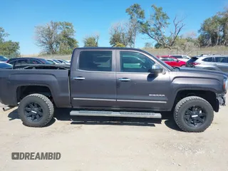 2016 GMC Sierra 1500 SLT with VIN 3GTU2NEC4GG285688, listed as a IAAI auction lot 40394598 with 121,940 mi miles and . Bid and sale history available at DreamBid. Image 13.