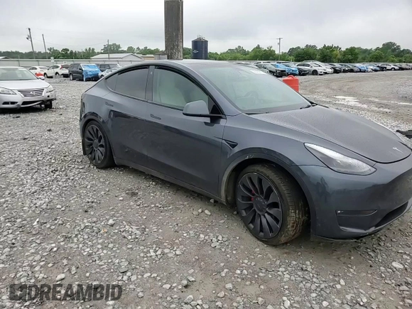 2022 Tesla Model Y Performance with VIN 7SAYGDEF7NF507184, listed as a Copart auction lot 58329875 with 98,320 mi miles and Salvage title. Bid and sale history available at DreamBid. Image 13.