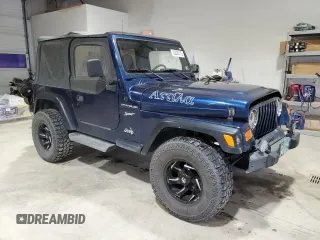 2002 Jeep Wrangler Sport with VIN 1J4FA49S82P703420, listed as a Copart auction lot 53322175 with 87,642 mi miles and Salvage Title. Bid and sale history available at carsss.com. Image 4.