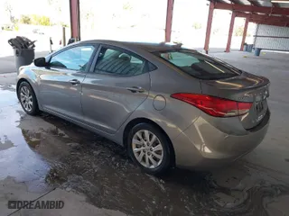 2012 Hyundai Elantra GLS PZEV with VIN KMHDH4AE5CU235756, listed as a IAAI auction lot 41312506 with 118,621 mi miles. Bid and sale history available at carsss.com. Image 3.