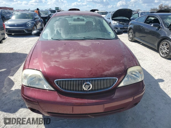 2004 Mercury Sable GS z VIN 1MEFM50U44G614186, wystawiony jako Copart lot #77822494 z przebiegiem 59 829 mil mil oraz Szkoda całkowita • Salvage title. Historia ofert i sprzedaży dostępna na DreamBid. Obrazek 5.