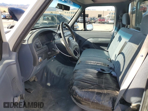 1993 Ford F-150 with VIN 1FTDF15Y4PNA36291, listed as a Copart auction lot 84710124 with 143,164 mi miles and Salvage Title. Bid and sale history available at carsss.com. Image 7.