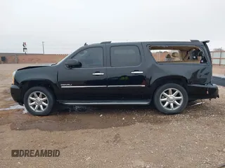 2014 GMC Yukon XL Denali with VIN 1GKS2MEF8ER239777, listed as a IAAI auction lot 41192009 with 142,656 mi miles. Bid and sale history available at carsss.com. Image 15.