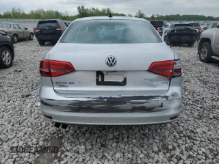 2015 Volkswagen Jetta SE z VIN 3VWD07AJ0FM252092, wystawiony jako Copart lot #56682945 z przebiegiem 104 325 mil mil oraz Czysty tytuł • Clean title. Historia ofert i sprzedaży dostępna na DreamBid. Obrazek 6.