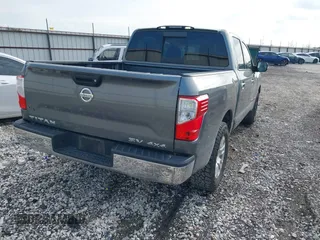 2018 Nissan Titan SV z VIN 1N6AA1EJ0JN518166, wystawiony jako IAAI lot #42124998 z przebiegiem 99 443 mil mil oraz . Historia ofert i sprzedaży dostępna na DreamBid. Obrazek 4.