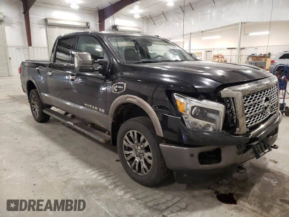 2016 Nissan Titan XD Platinum Reserve with VIN 1N6BA1F49GN517376, listed as a Copart auction lot 81189484 with 147,435 mi miles and Salvage Title. Bid and sale history available at carsss.com. Image 4.
