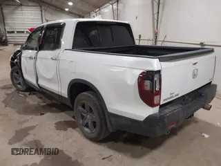 2022 Honda Ridgeline RTL-E z VIN 5FPYK3F76NB033832, wystawiony jako IAAI lot #41838047 z przebiegiem 16 497 mil mil oraz . Historia ofert i sprzedaży dostępna na DreamBid. Obrazek 3.