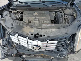 2014 Cadillac SRX Performance Collection с VIN 3GYFNCE34ES580069, выставлен на аукционе Copart как лот 60662415 с пробегом 141 107 миль миль и Списание • Salvage title. История ставок и продаж доступна на DreamBid. Изображение 11.