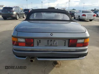 1991 Porsche 944 z VIN WP0ZZZ94ZLN431804, wystawiony jako Copart lot #73870554 z przebiegiem 131 475 mil mil oraz Szkoda całkowita • Salvage title. Historia ofert i sprzedaży dostępna na DreamBid. Obrazek 6.
