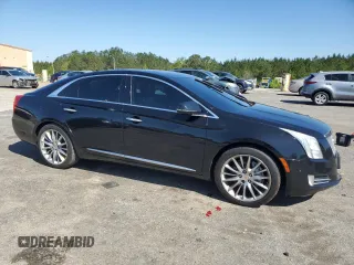 2014 Cadillac XTS Premium z VIN 2G61P5S3XE9238362, wystawiony jako Copart lot #52135695 z przebiegiem 122 428 mil mil oraz Szkoda całkowita • Salvage title. Historia ofert i sprzedaży dostępna na DreamBid. Obrazek 4.
