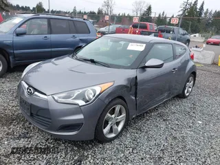 2012 Hyundai Veloster w/Gray Int z VIN KMHTC6AD7CU037130, wystawiony jako IAAI lot #41778588 z przebiegiem 125 549 mil mil oraz . Historia ofert i sprzedaży dostępna na DreamBid. Obrazek 17.