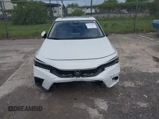 2023 Honda Civic EX-L with VIN 19XFL1H70PE014510, listed as a IAAI auction lot 42395890 with 14,163 mi miles and . Bid and sale history available at DreamBid. Image 12.