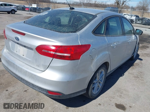 2018 Ford Focus SE with VIN 1FADP3F23JL315341, listed as a IAAI auction lot 41834939 with 121,686 mi miles. Bid and sale history available at carsss.com. Image 4.