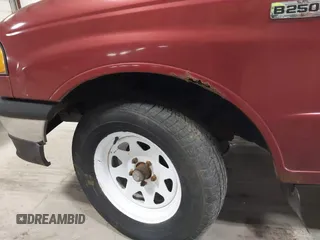 1999 Mazda B-Series Truck SX with VIN 4F4YR12C8XTM08476, listed as a IAAI auction lot 41864144 with 187,847 mi miles and . Bid and sale history available at DreamBid. Image 12.