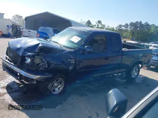 2003 Ford F-150 XL with VIN 1FTRX18LX3NA50127, listed as a IAAI auction lot 42145481 with 199,955 mi miles and . Bid and sale history available at DreamBid. Image 14.