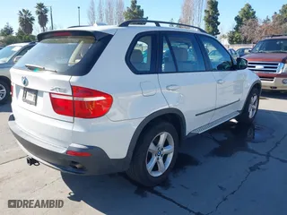2007 BMW X5 3.0si with VIN 5UXFE43567LY82907, listed as a IAAI auction lot 41499356 with 117,173 mi miles. Bid and sale history available at carsss.com. Image 4.
