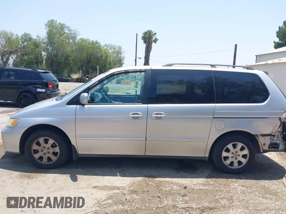 2004 Honda Odyssey EX-L with VIN 5FNRL18774B028164, listed as a IAAI auction lot 42454877 with 135,720 mi miles and . Bid and sale history available at DreamBid. Image 14.
