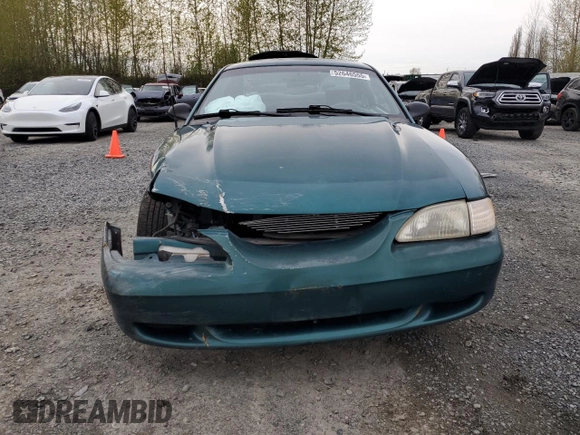 1997 Ford Mustang with VIN 1FALP4044VF101619, listed as a Copart auction lot 52646555 with 189,003 mi miles and Salvage Title. Bid and sale history available at carsss.com. Image 5.