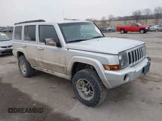 2007 Jeep Commander Sport with VIN 1J8HG48P07C577569, listed as a IAAI auction lot 41497583 with 245,446 mi miles. Bid and sale history available at carsss.com. Image 1.
