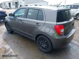 2008 Scion xD with VIN JTKKU10438J018528, listed as a IAAI auction lot 41749318 with 162,052 mi miles. Bid and sale history available at carsss.com. Image 3.