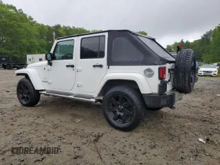 2013 Jeep Wrangler Unlimited Sahara with VIN 1C4HJWEG4DL562951, listed as a Copart auction lot 58001475 with 95,744 mi miles and Clean title. Bid and sale history available at DreamBid. Image 2.