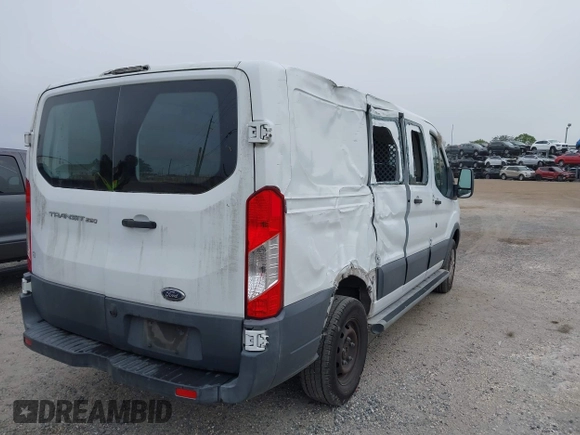 2016 Ford Transit Cargo z VIN 1FTYR1ZM3GKB36643, wystawiony jako IAAI lot #41127604 z przebiegiem 182 845 mil mil oraz . Historia ofert i sprzedaży dostępna na DreamBid. Obrazek 4.