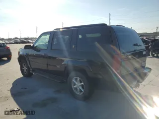 2000 Cadillac Escalade with VIN 1GYEK13R0YR167895, listed as a Copart auction lot 82586443 with 267,099 mi miles and Salvage Title. Bid and sale history available at carsss.com. Image 2.