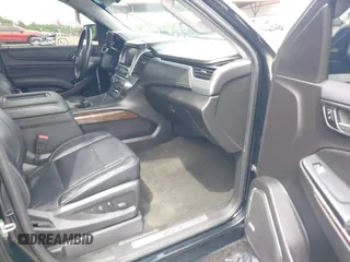2017 Chevrolet Tahoe LT z VIN 1GNSKBKC8HR311969, wystawiony jako IAAI lot #42126414 z przebiegiem 160 994 mil mil oraz . Historia ofert i sprzedaży dostępna na DreamBid. Obrazek 5.