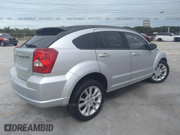 2011 Dodge Caliber Heat with VIN 1B3CB5HA7BD160827, listed as a IAAI auction lot 41374295 with 127,403 mi miles and . Bid and sale history available at DreamBid. Image 4.