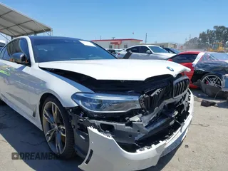 2020 BMW 5 Series M550i xDrive with VIN WBAJS7C0XLCD42738, listed as a IAAI auction lot 42326945 with 50,046 mi miles and . Bid and sale history available at DreamBid. Image 6.