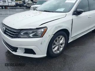 2016 Volkswagen Passat S with VIN 1VWAT7A38GC056495, listed as a IAAI auction lot 41965717 with 163,254 mi miles and . Bid and sale history available at DreamBid. Image 6.