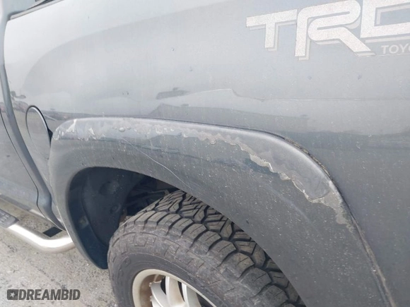 2007 Toyota Tundra LTD with VIN 5TBEV58197S459237, listed as a IAAI auction lot 41852184 with 339,929 mi miles. Bid and sale history available at carsss.com. Image 6.