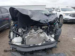 2024 Honda Civic LX z VIN 19XFL2H5XRE023870, wystawiony jako IAAI lot #41776260 z przebiegiem Nie podano mil oraz . Historia ofert i sprzedaży dostępna na DreamBid. Obrazek 11.