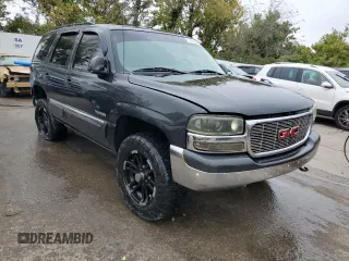 2003 GMC Yukon SLE with VIN 1GKEK13V33R298724, listed as a Copart auction lot 71219164 with 216,503 mi miles and Salvage Title. Bid and sale history available at carsss.com. Image 4.
