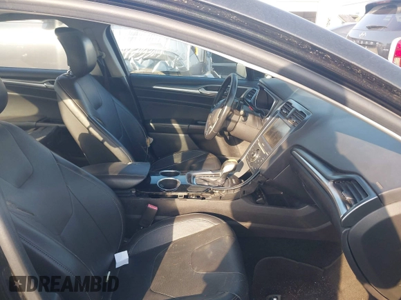 2014 Ford Fusion Titanium with VIN 3FA6P0K94ER115795, listed as a IAAI auction lot 42230295 with 266,277 mi miles and . Bid and sale history available at DreamBid. Image 5.