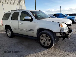 2011 GMC Yukon SLT with VIN 1GKS1CE01BR131442, listed as a Copart auction lot 79490004 with 211,307 mi miles and Salvage Title. Bid and sale history available at carsss.com. Image 4.