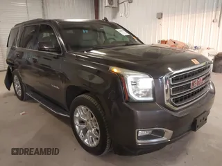 2016 GMC Yukon SLT with VIN 1GKS2BKC8GR277799, listed as a IAAI auction lot 41400549 with 91,139 mi miles. Bid and sale history available at carsss.com. Image 1.